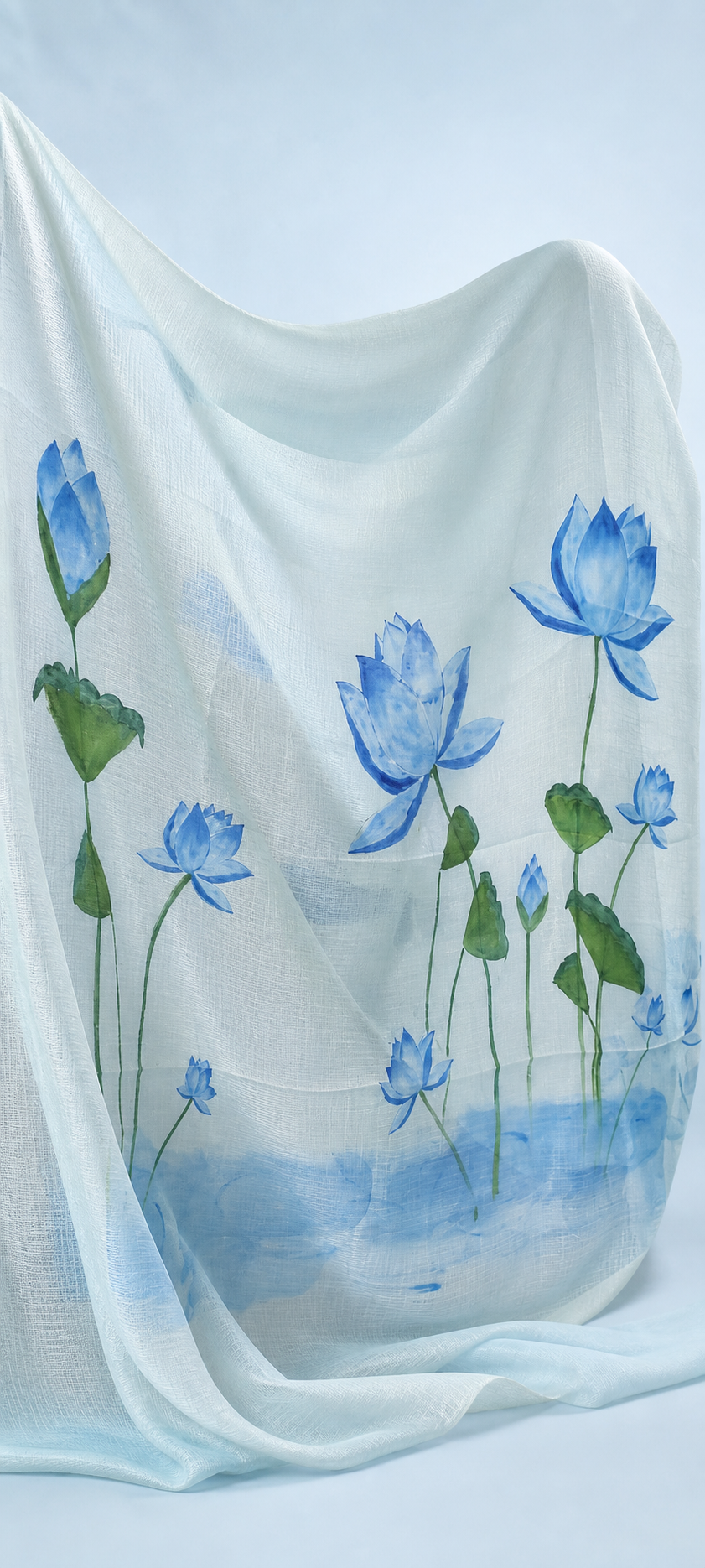 Detail of the hand-painted blue lotus motif on Kotta fabric