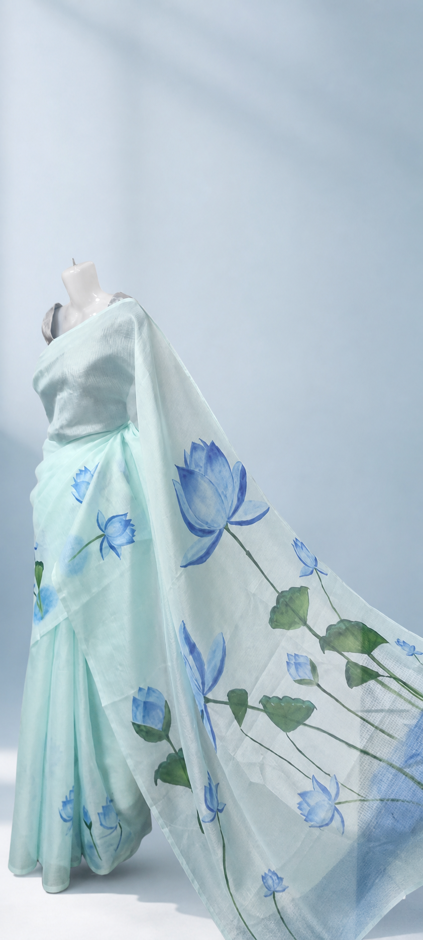 Blue Lotus Kotta saree pallu view in a soft blue studio